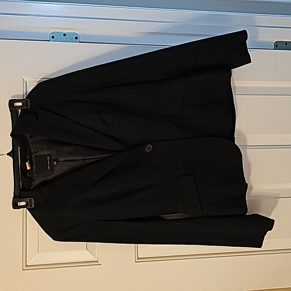 The limited suit jacket. Size 12. Dry cleaned